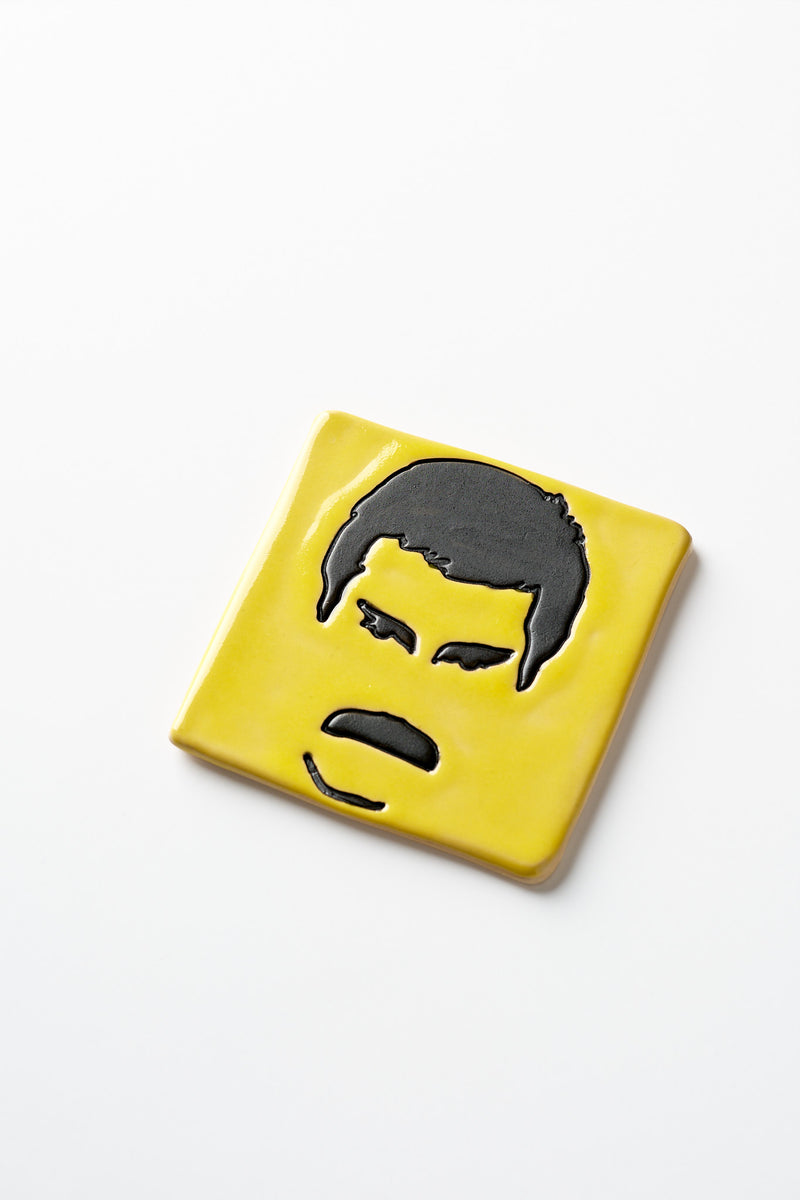 Handcrafted ceramic art tile with the Freddie motif