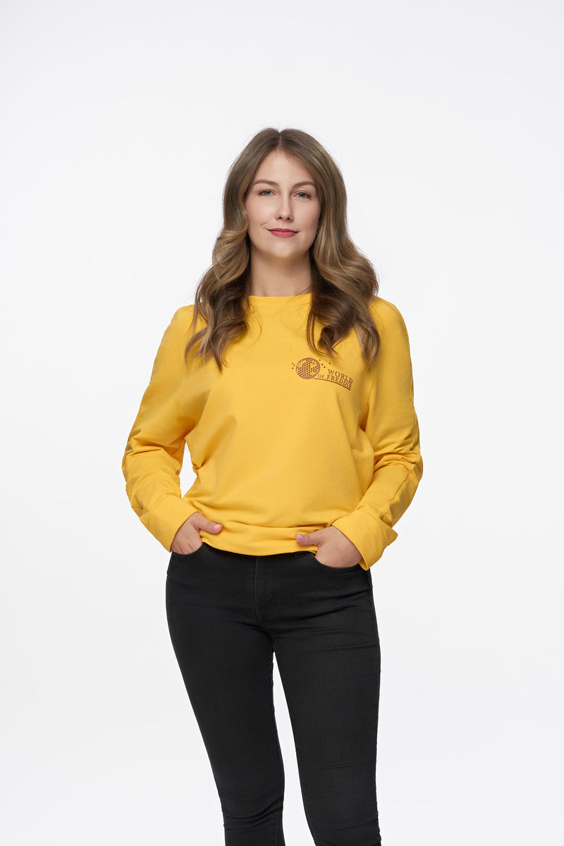 Woman wearing the Signature Yellow Sweatshirt, front view