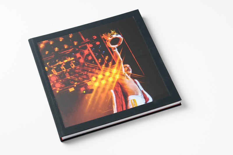 The book cover with a Queen concert photograph