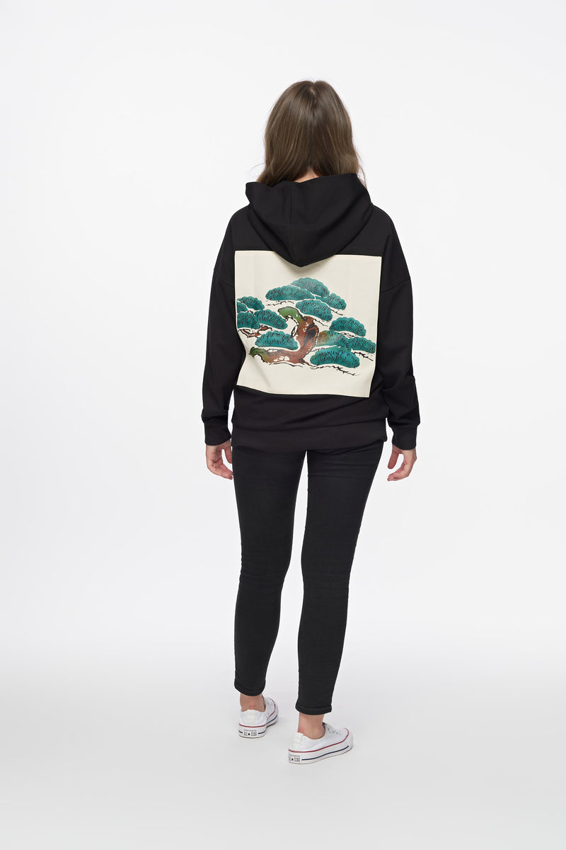Back of the Tree Edition Hoodie with the pine print