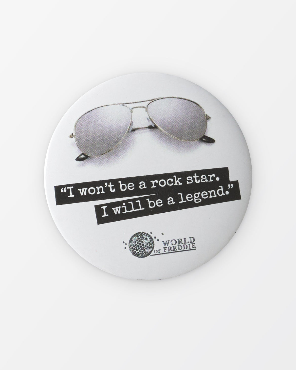 Placka s citátem „I won’t be a rock star. I will be a legend.“